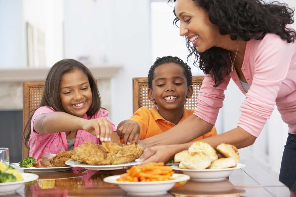 family eating food at a table