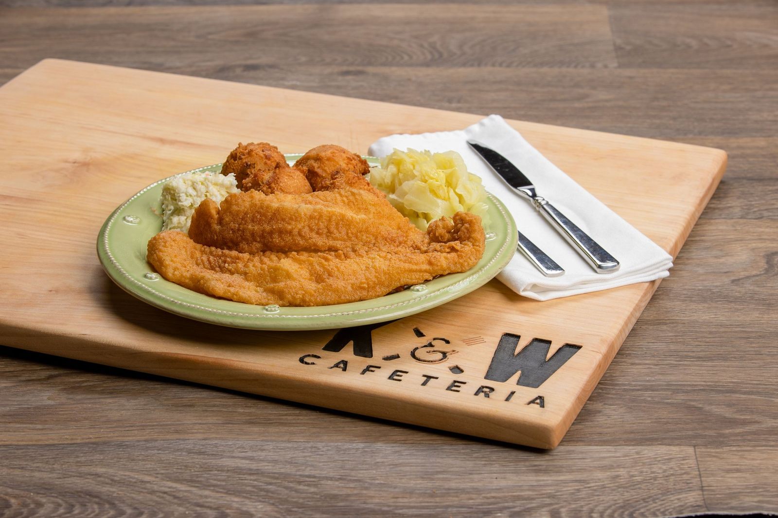 Plate of fried fish with hushpuppies