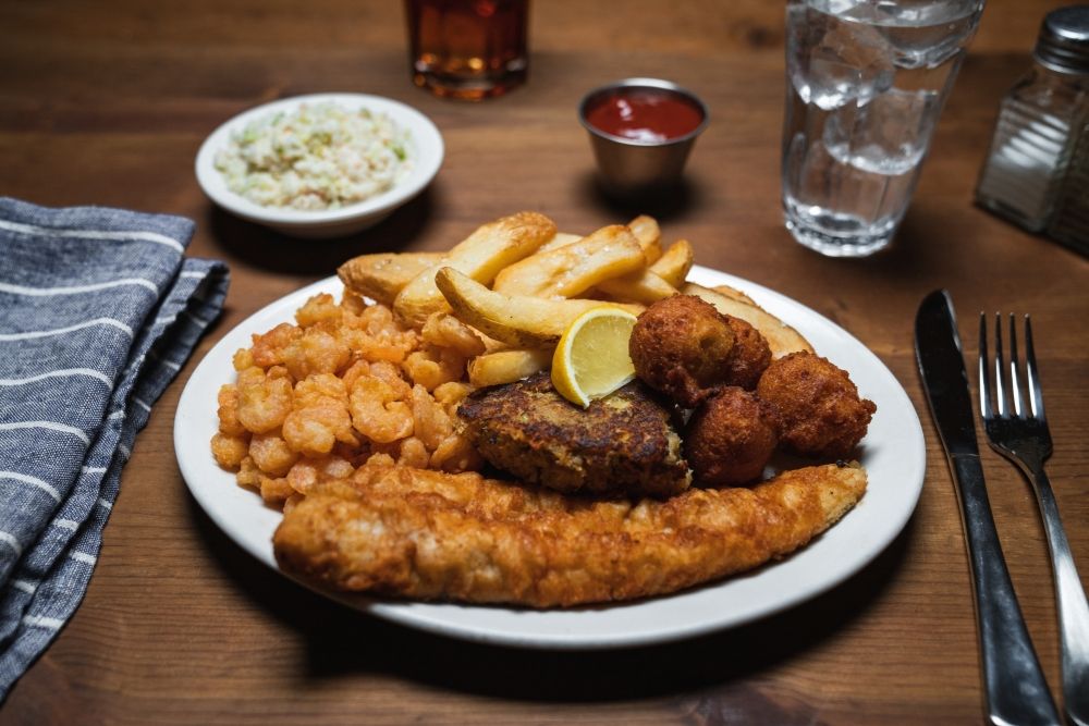 Plate of fried seafood and fries