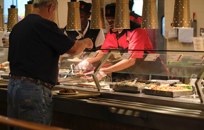 KW cafeteria man getting food