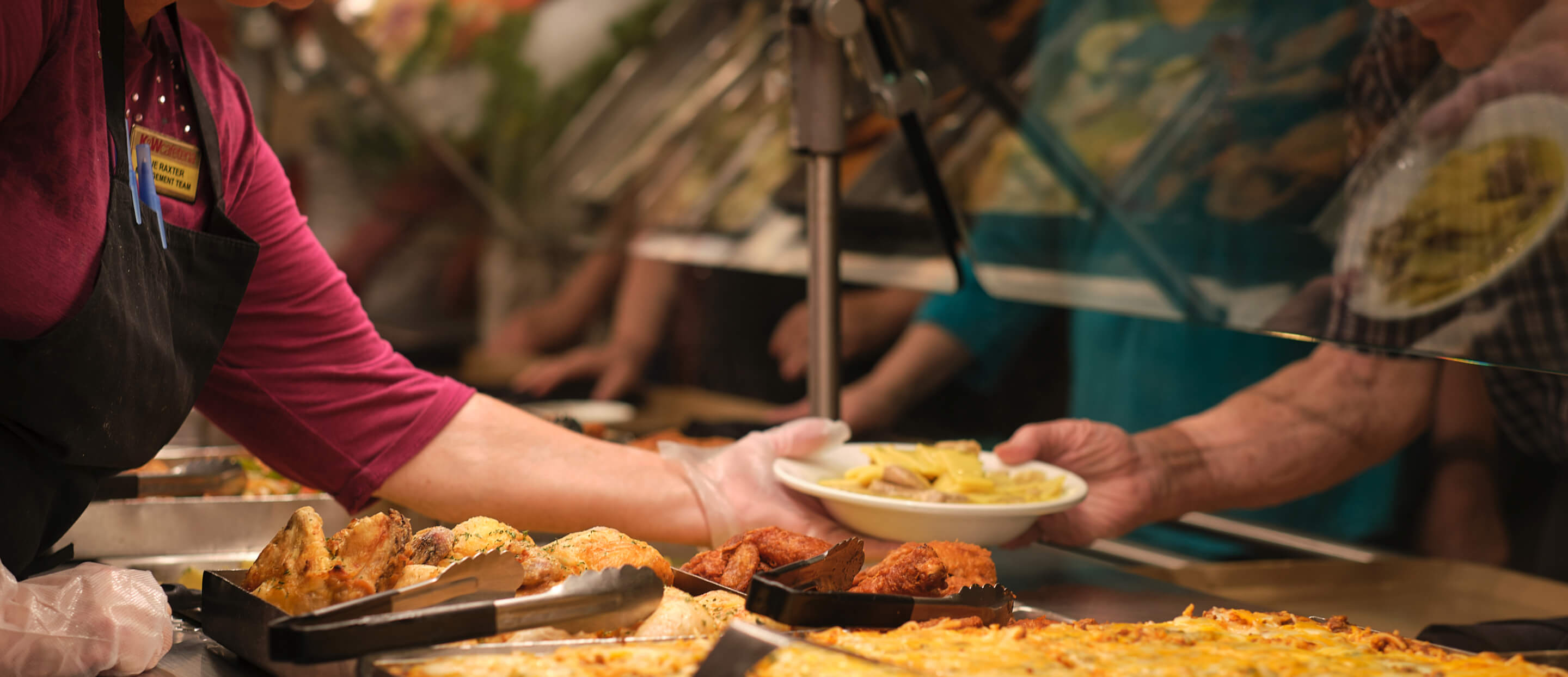 K&W Cafeteria Server Handing Food to Customer