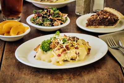 chickem Francisco with salad and baked peaches