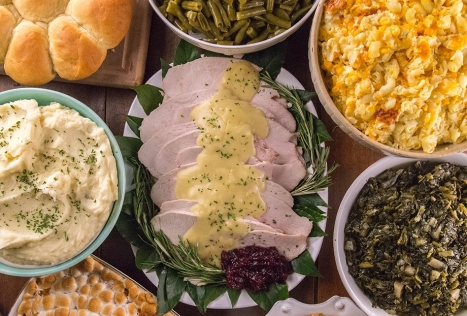 feat of turkey and dressing, potatoes, mac and cheese, and turnips