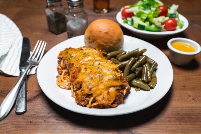 baked spaghetti with green beans and a roll